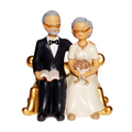 Couple de Seniors sur fauteuil doré H. 15cm - pièce